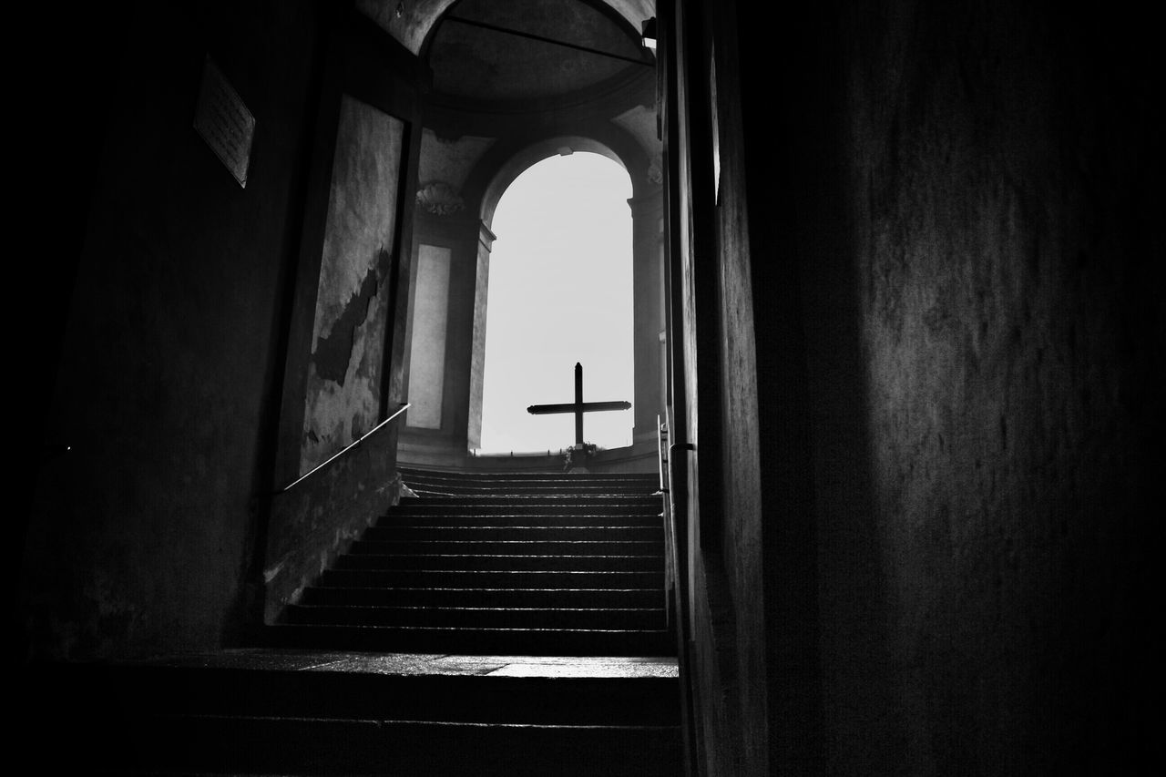 architecture, indoors, built structure, steps, arch, steps and staircases, staircase, the way forward, low angle view, stairs, railing, building, wall - building feature, entrance, no people, archway, old, day, window, diminishing perspective