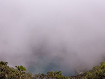 Scenic view of volcanic mountain against sky