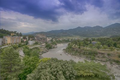 High angle view of trees and mountains against sky