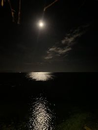 Scenic view of sea against sky at night
