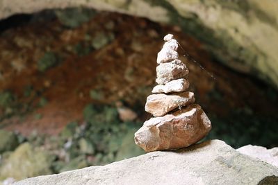 Close-up of stone stack on rock