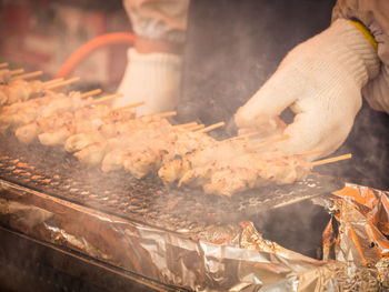 Close-up of meat on barbecue grill