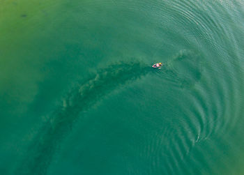 High angle view of boat on sea shore