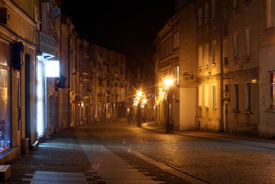 Illuminated street at night