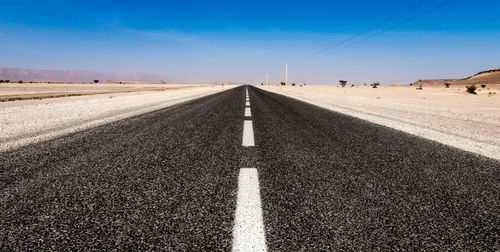 Surface level of road against sky