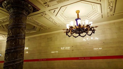 Low angle view of illuminated ceiling