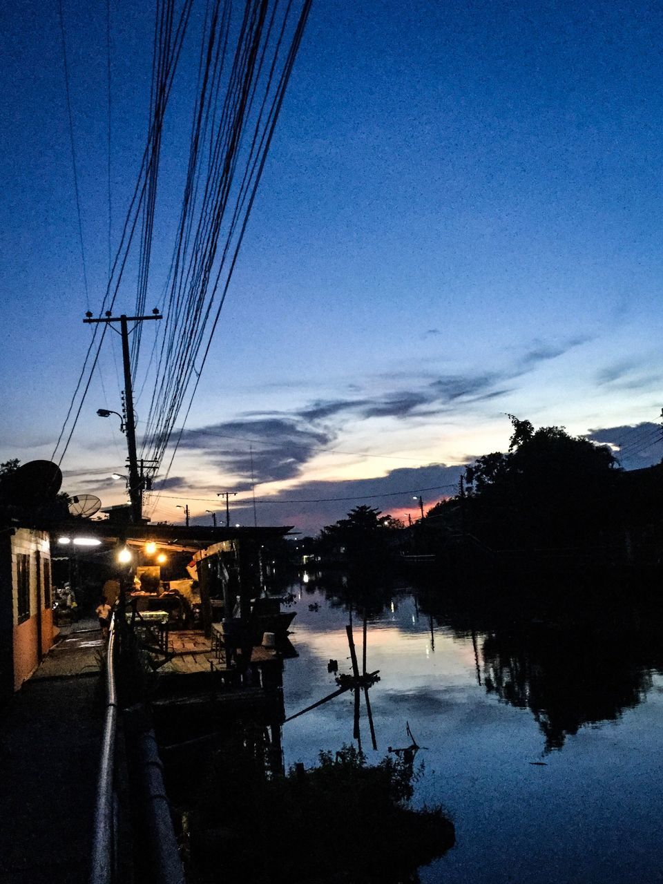 SILHOUETTE OF HARBOR AT DUSK