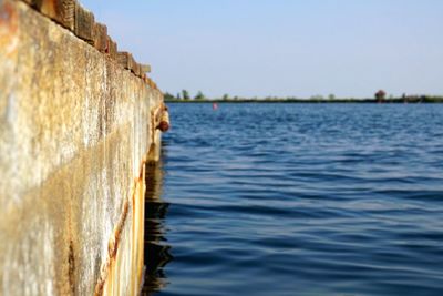 Close-up of sea against clear sky