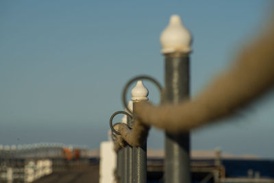 Rope railing with eyelet of a landing stage in the evening light. close-up. scene from egypt.
