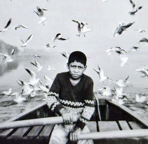 Portrait of boy in bird