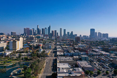 High angle view of buildings in city against sky