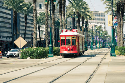 Historic cable cars run in dowtown new orleans, louisiana on 10-08-2022