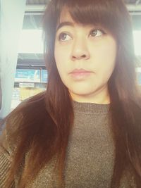 Close-up portrait of young woman