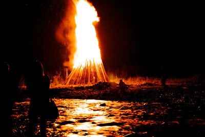 Bonfire on landscape at night