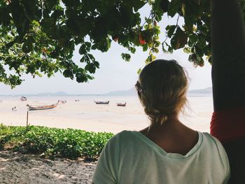 Rear view of woman looking at sea
