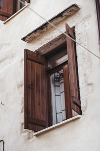 Low angle view of closed door of building