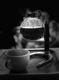 Close-up of coffee cup on table