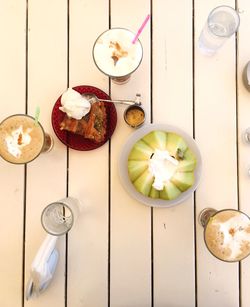 High angle view of fruits in plate on table