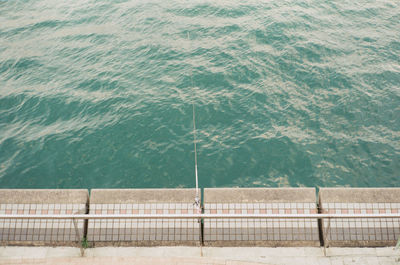 High angle view of swimming pool by sea