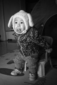 Portrait of cute baby girl at home