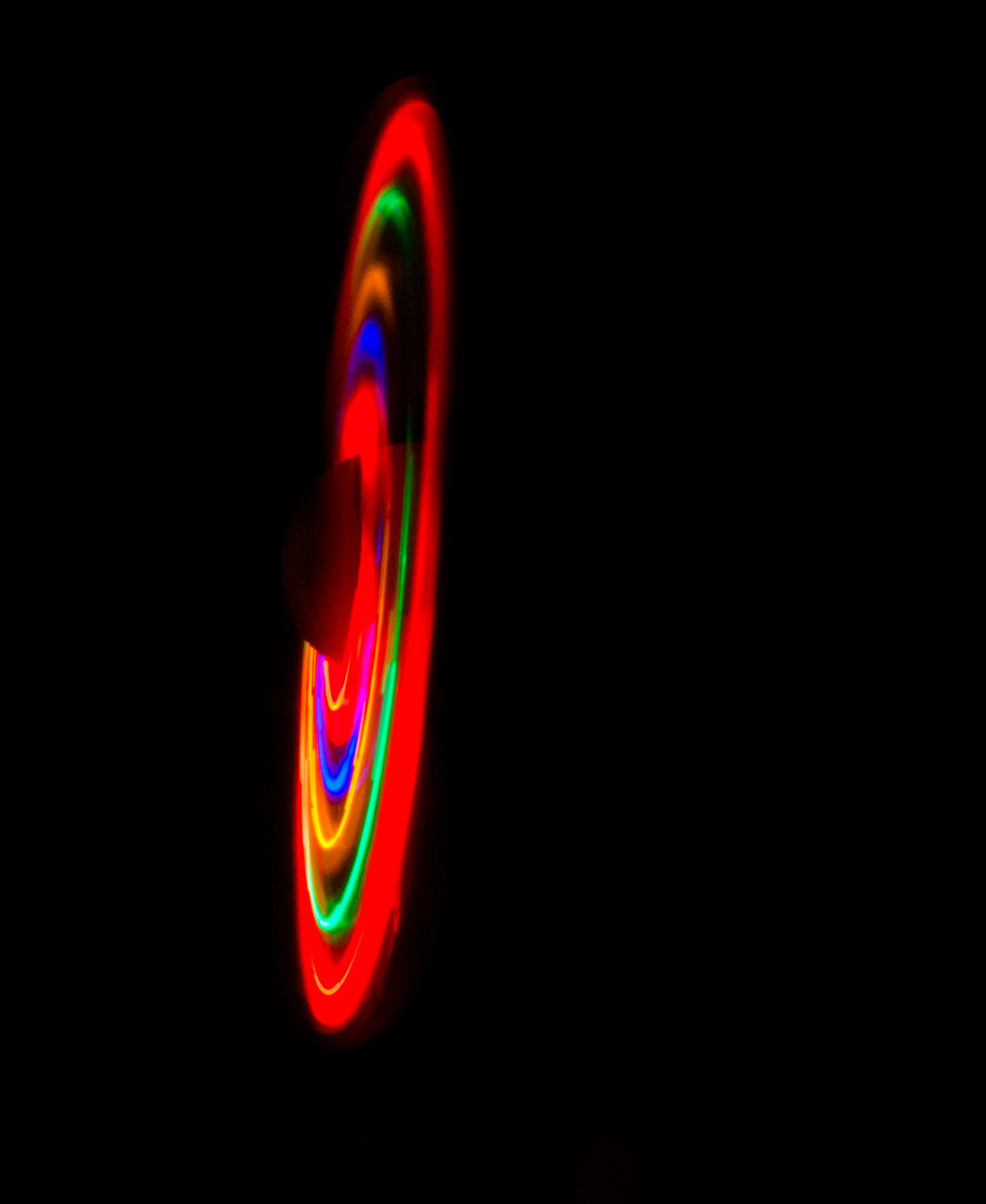 CLOSE-UP OF ILLUMINATED LIGHT PAINTING