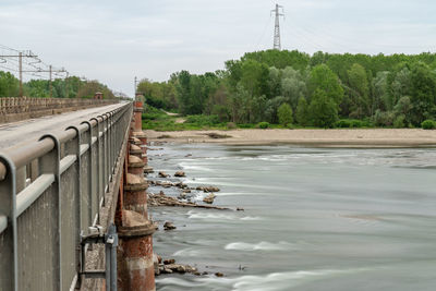 Bridge over river against sky