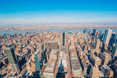 High angle view of city buildings against sky
