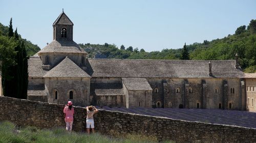 People walking on grass