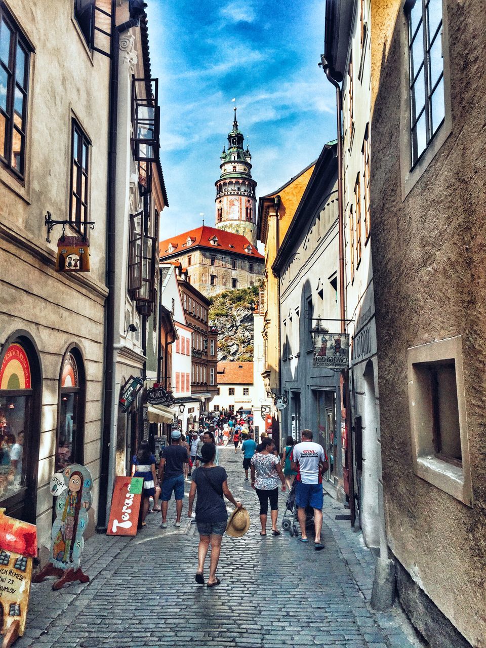 architecture, building exterior, built structure, men, cobblestone, the way forward, person, sky, large group of people, street, walking, city, lifestyles, old town, city life, place of worship, travel, religion, travel destinations