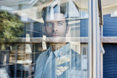 Mid adult man at his home, portrait