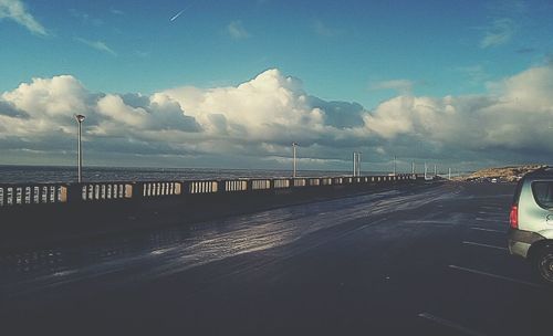 Scenic view of sea against cloudy sky