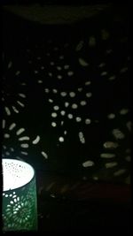 Lamp post in dark room