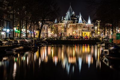 Reflection of illuminated buildings in water