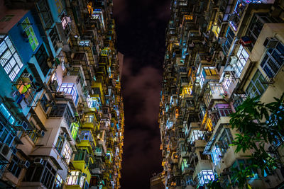 High angle view of illuminated buildings in city