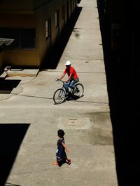 Boy riding bicycle