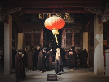 Group of people in front of building