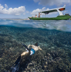 Young man snorkeling, underwater view