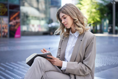 Young woman using mobile phone