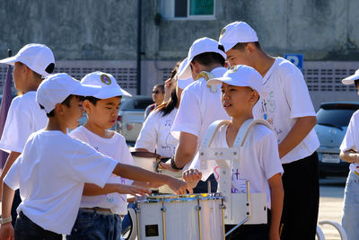 People standing in traditional clothing