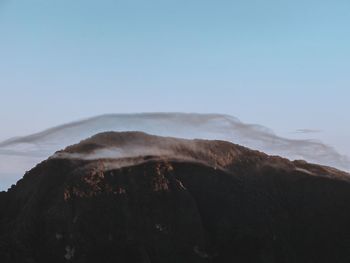 Scenic view of volcanic mountain against clear sky