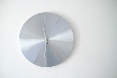 Close-up of clock against white background