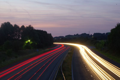 Light trails on road at night