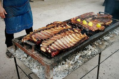 Close-up of meat on barbecue grill