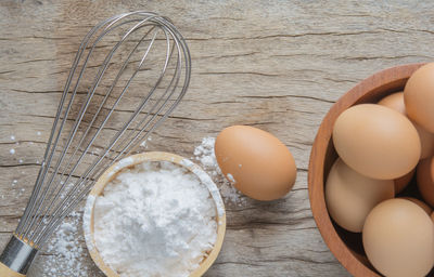 High angle view of eggs in container on table