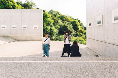 Children in front of building