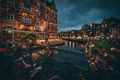 Illuminated buildings in city at night
