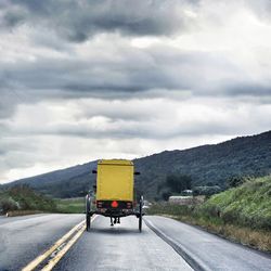 Road against cloudy sky