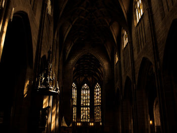 Low angle view of illuminated ceiling of building