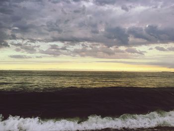 Scenic view of sea against sky at sunset