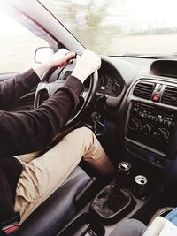 Woman sitting in car